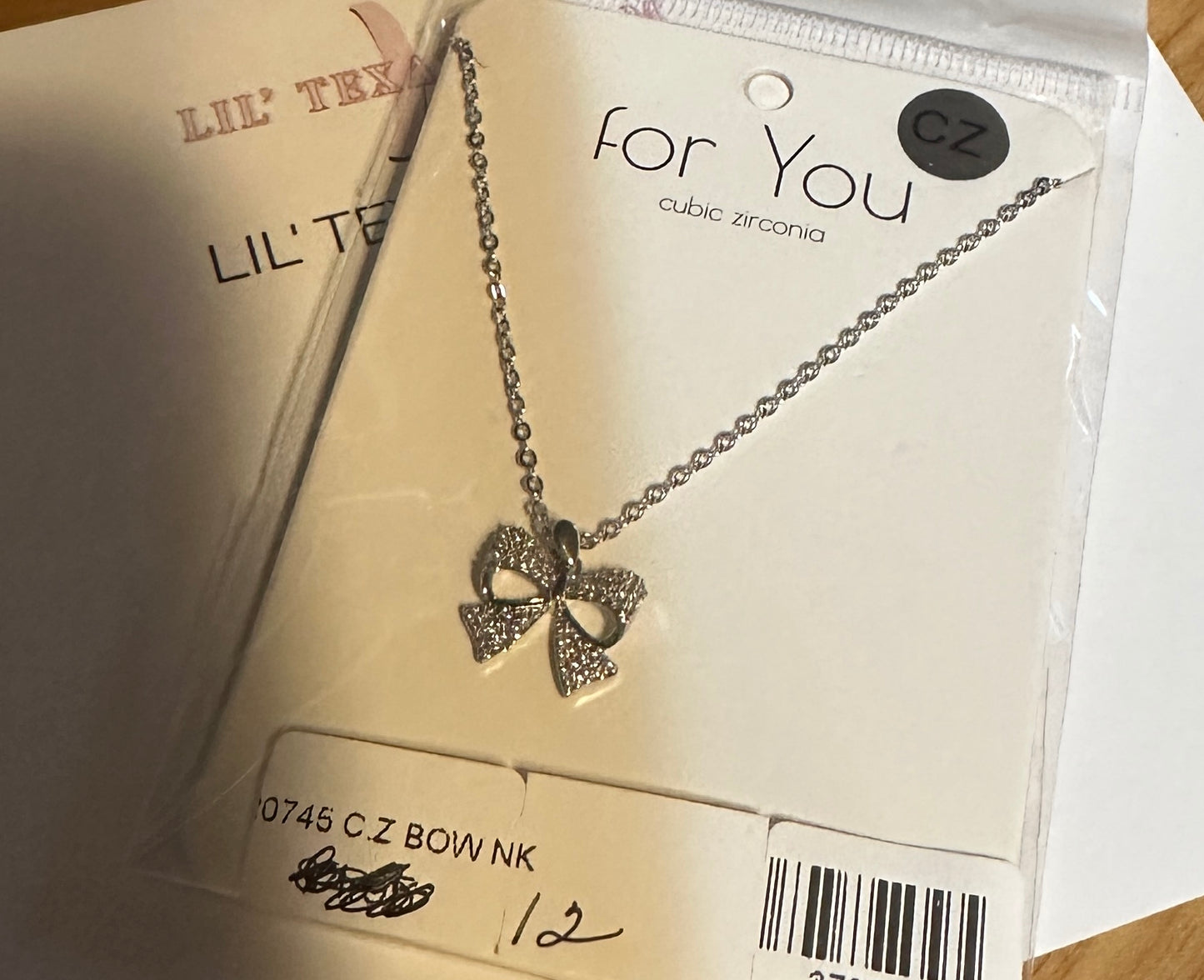 Silver Cubic Bow Necklace