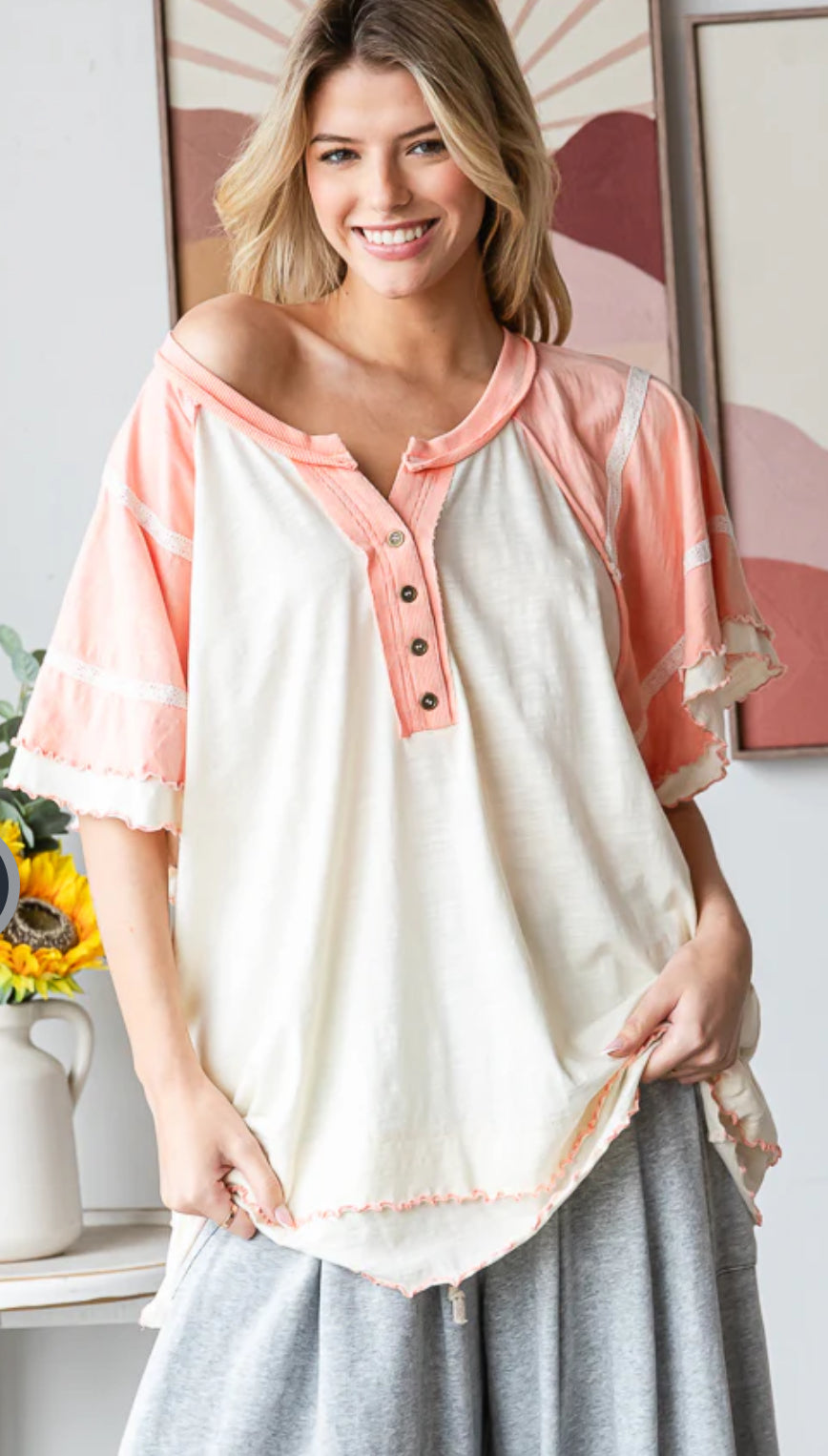 Oversized wavy hem V-neck top