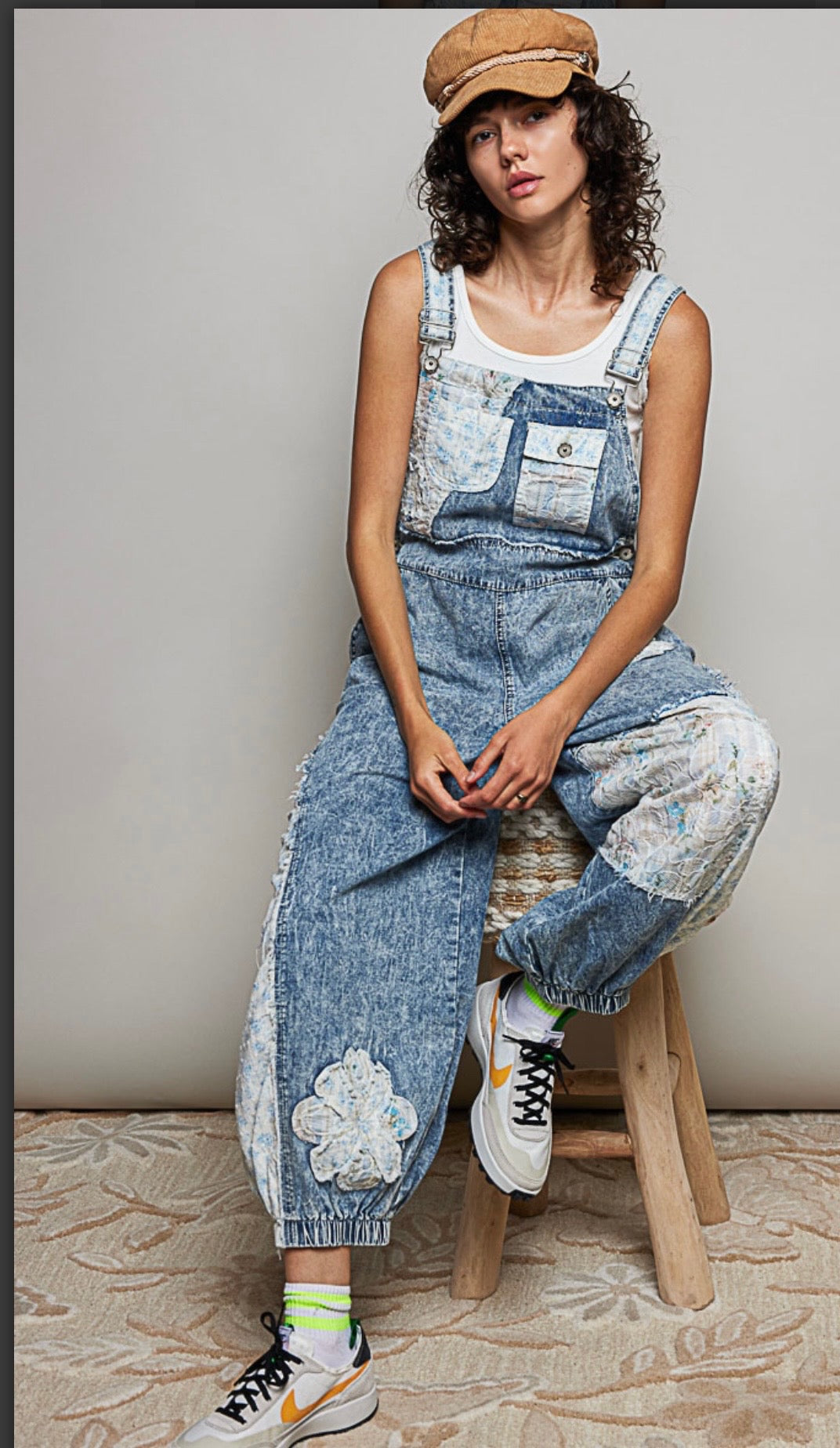Denim jogger fit overalls with varied shape patch accents