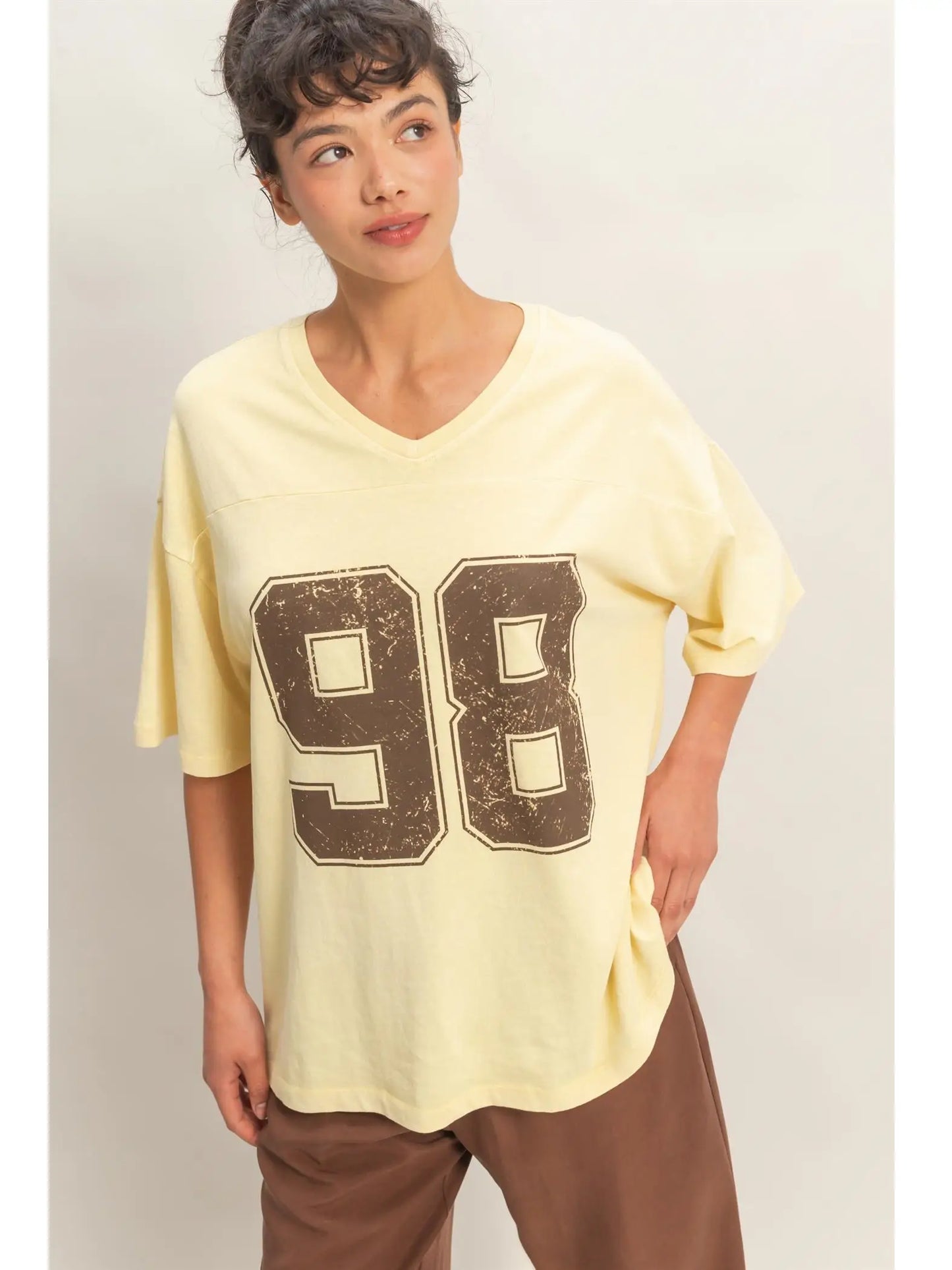 Oversized Varsity Style V-Neck Graphic T-Shirt