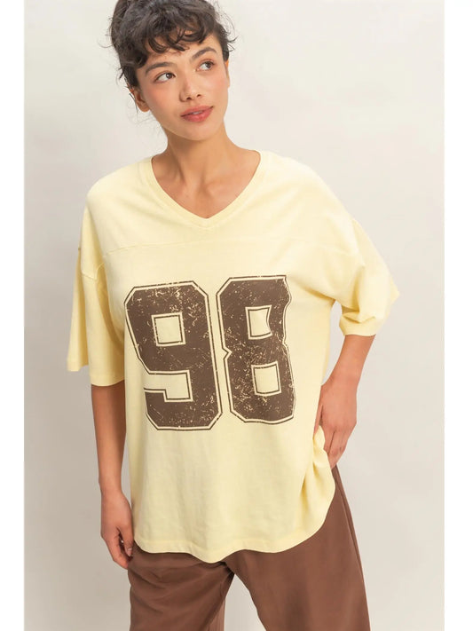 Oversized Varsity Style V-Neck Graphic T-Shirt
